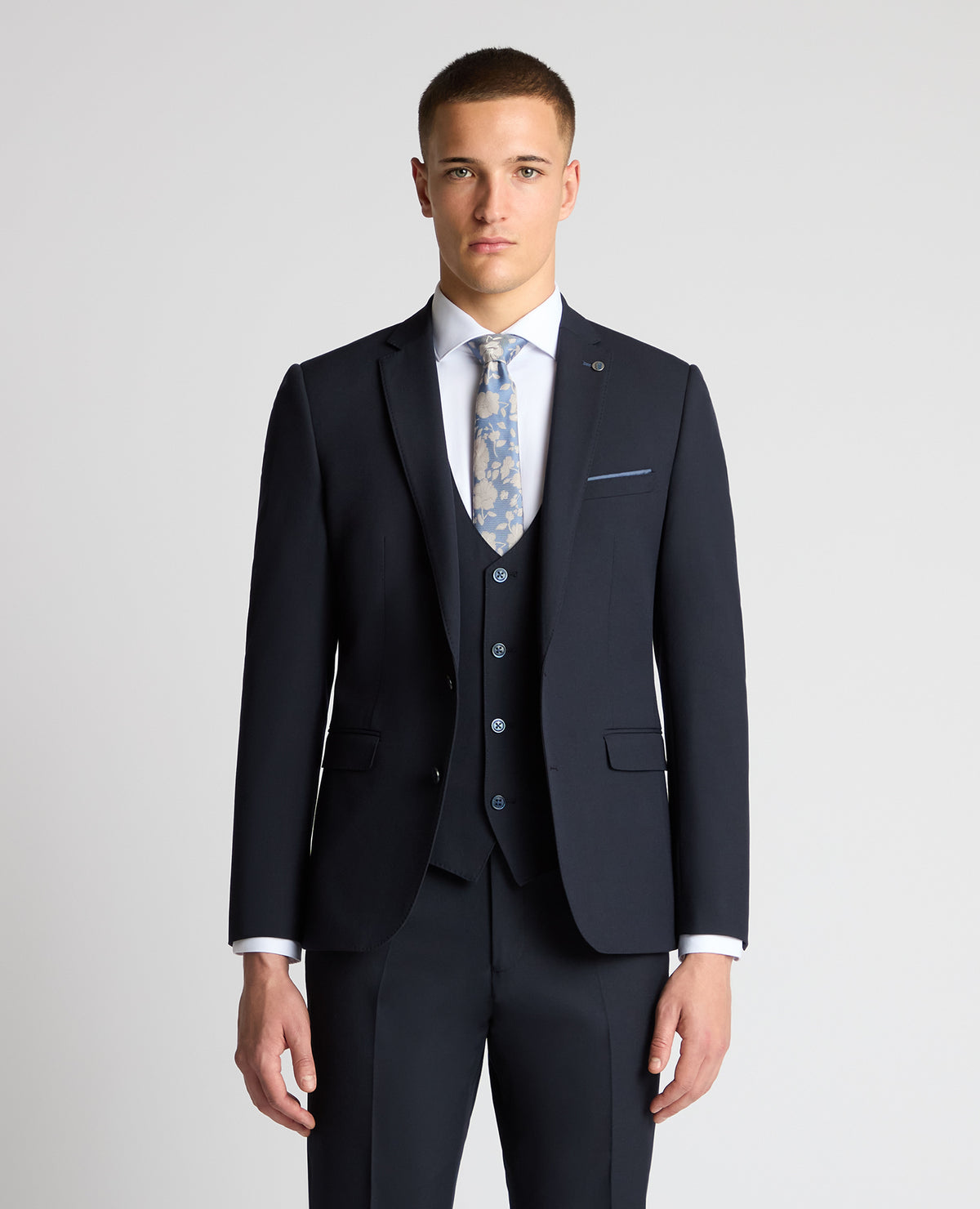 Man wearing a navy suit