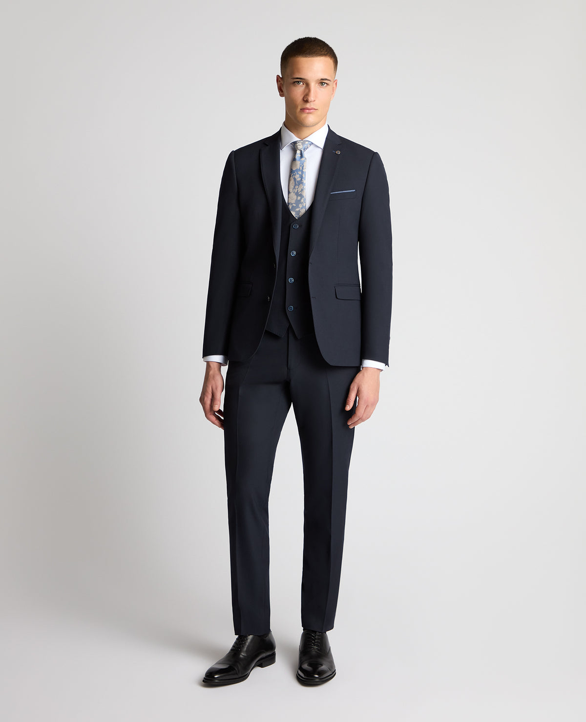Man wearing a navy suit