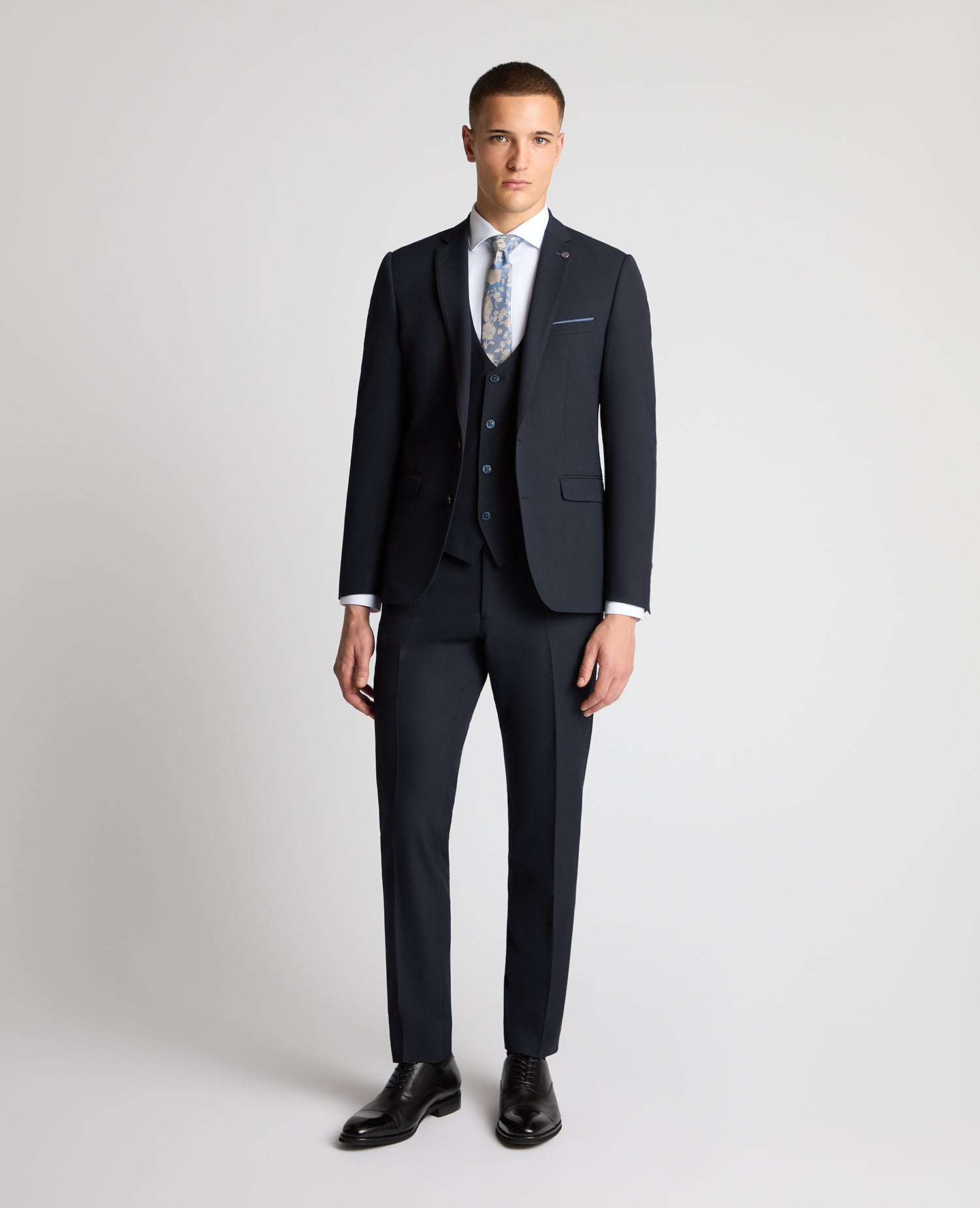 Man wearing a navy suit