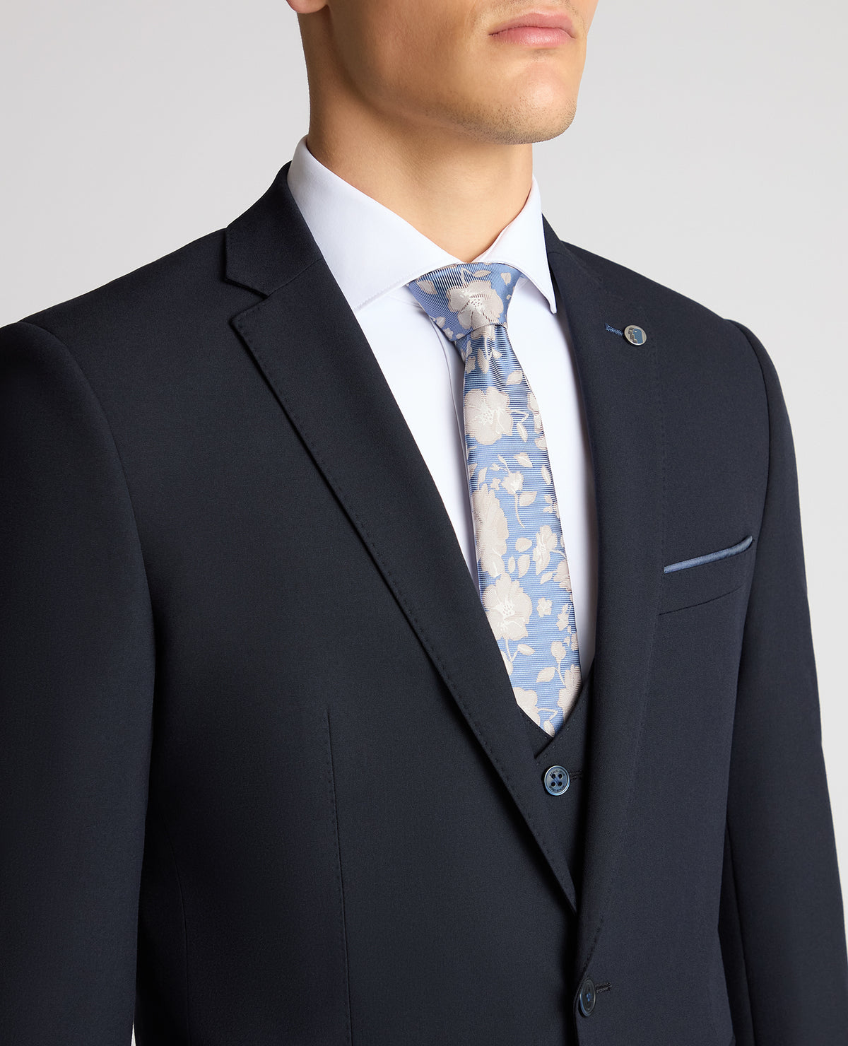 Man wearing a navy suit