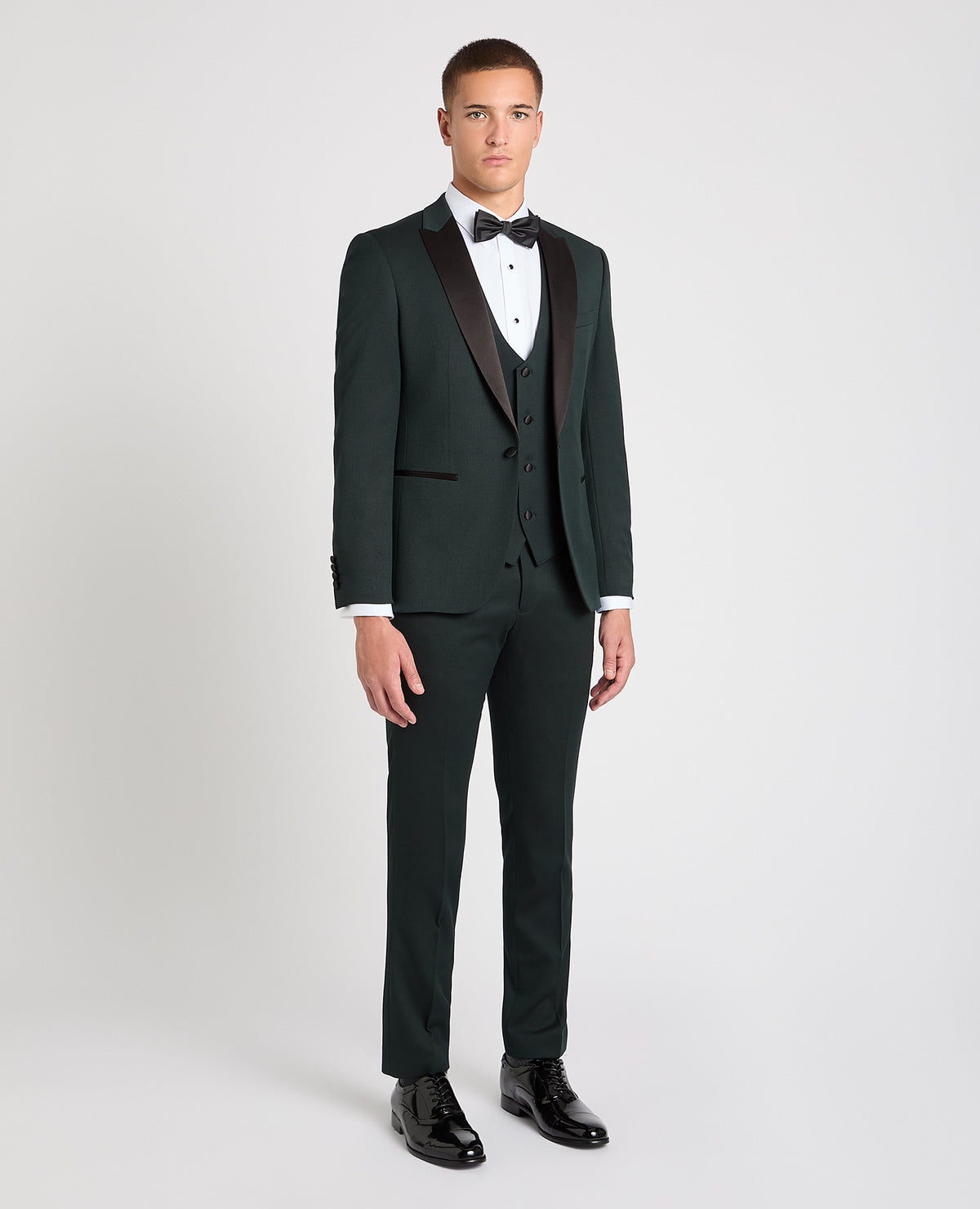Man wearing a green suit