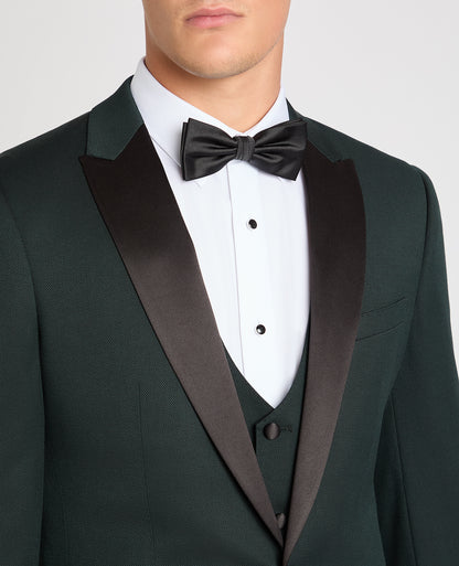 Man wearing a green suit