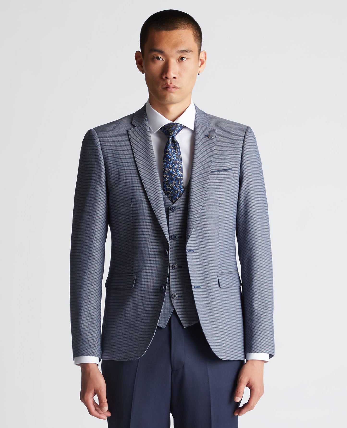 Man wearing a blue Slim Fit Stretch Mix and Match Suit Jacket