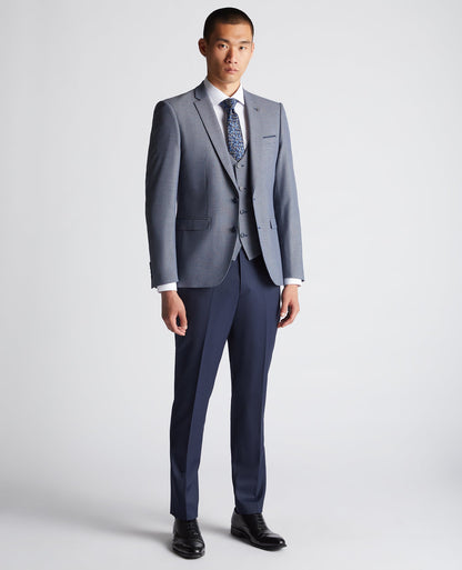 Man wearing a blue Slim Fit Stretch Mix and Match Suit Jacket