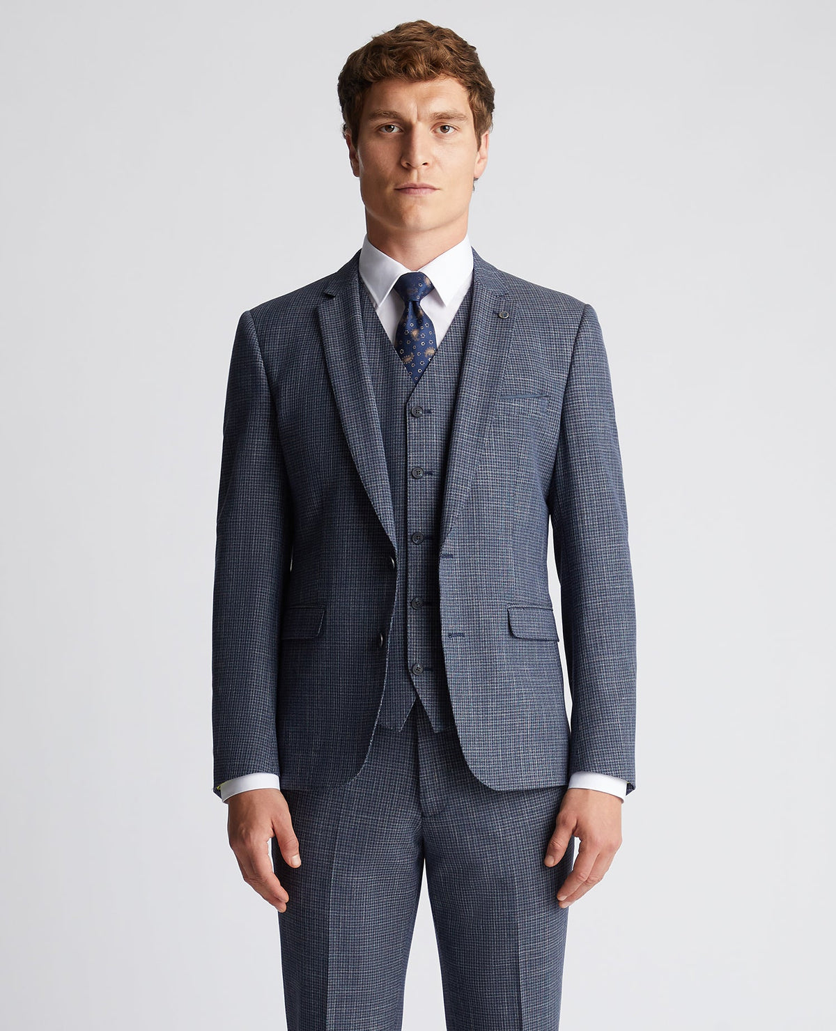 Man wearing a blue Slim Fit Checked Stretch Suit Jacket