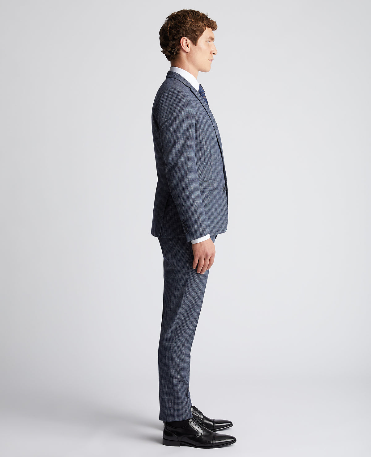 Man wearing a blue Slim Fit Checked Stretch Suit
