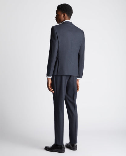 Man wearing a navy Slim Fit Stretch Suit