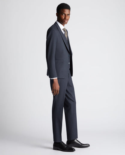 Man wearing a navy Slim Fit Stretch Suit