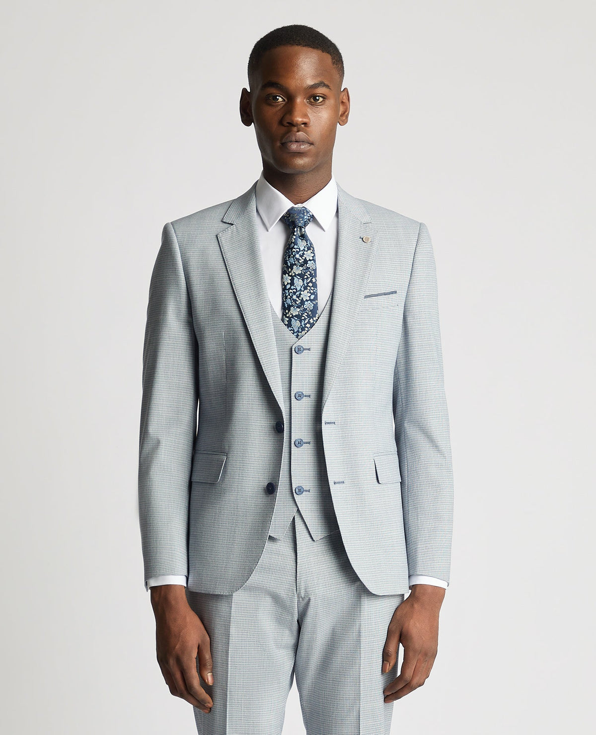 Man wearing a blue Slim Fit Micro Houndstooth Suit