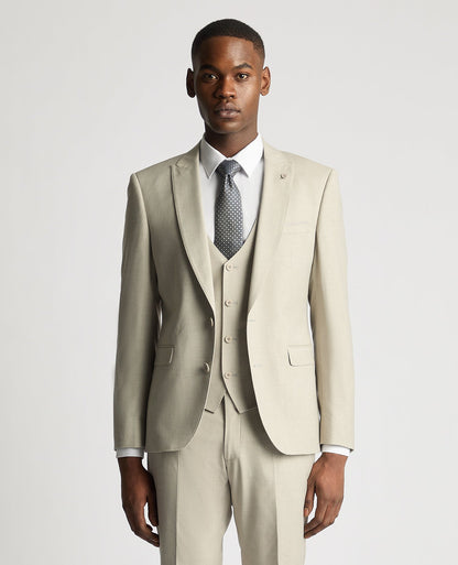 Man wearing a sand Slim Fit Stretch Suit Jacket