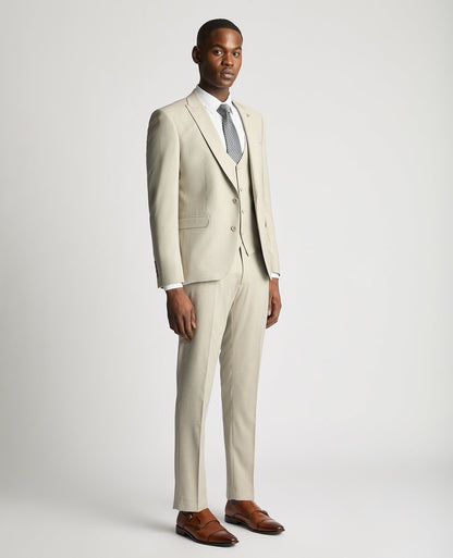Man wearing a sand Slim Fit Stretch Suit Jacket