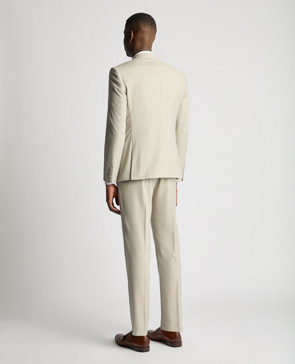 Man wearing a sand Slim Fit Stretch Suit Jacket