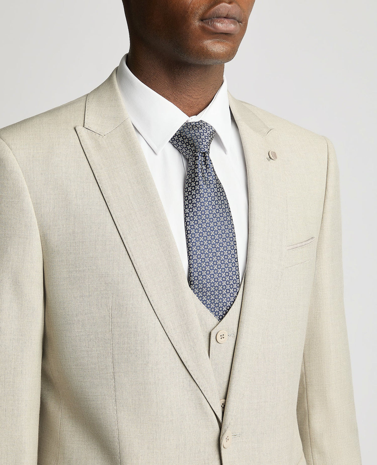 Man wearing a sand Slim Fit Stretch Suit Jacket