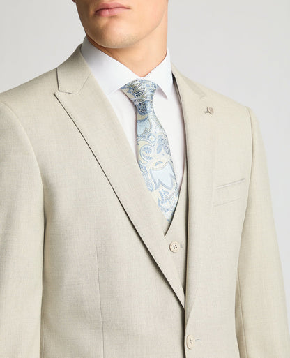 Man wearing a sand Tapered Fit Stretch Suit