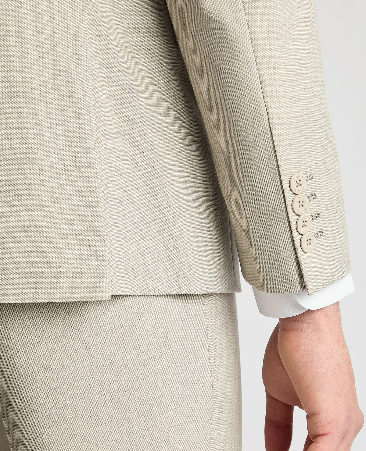 Man wearing a sand Tapered Fit Stretch Suit