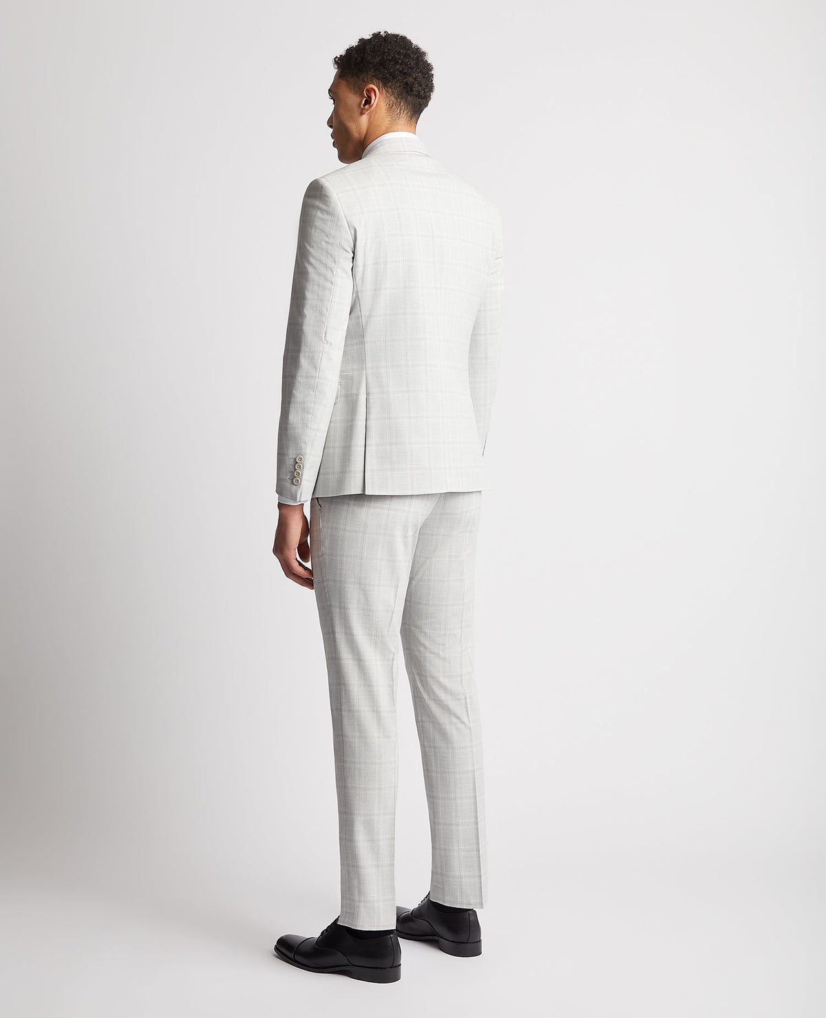 Man wearing a grey Slim Fit Stretch Suit Jacket