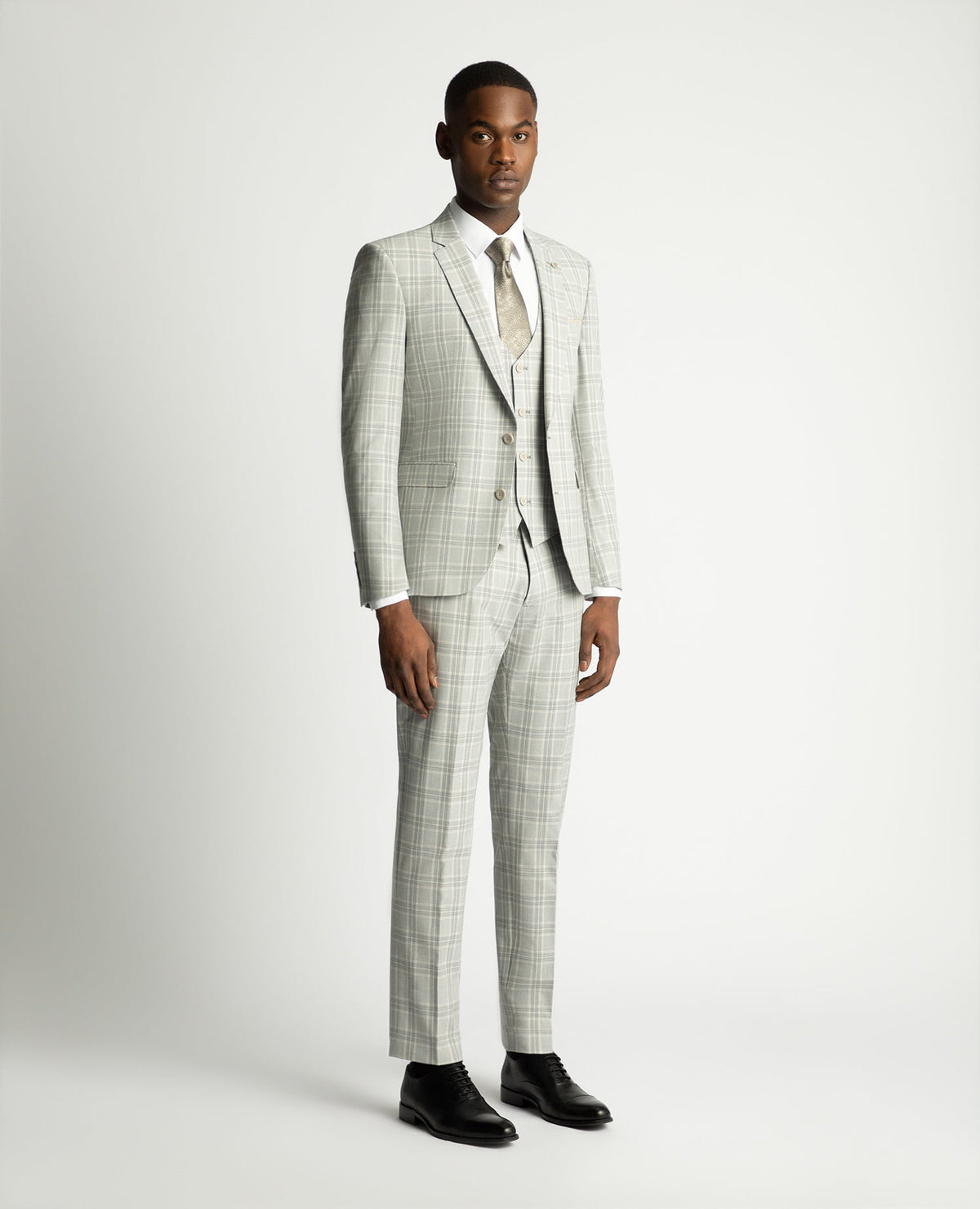 Man wearing a grey Slim Fit Mix and Match Suit Jacket