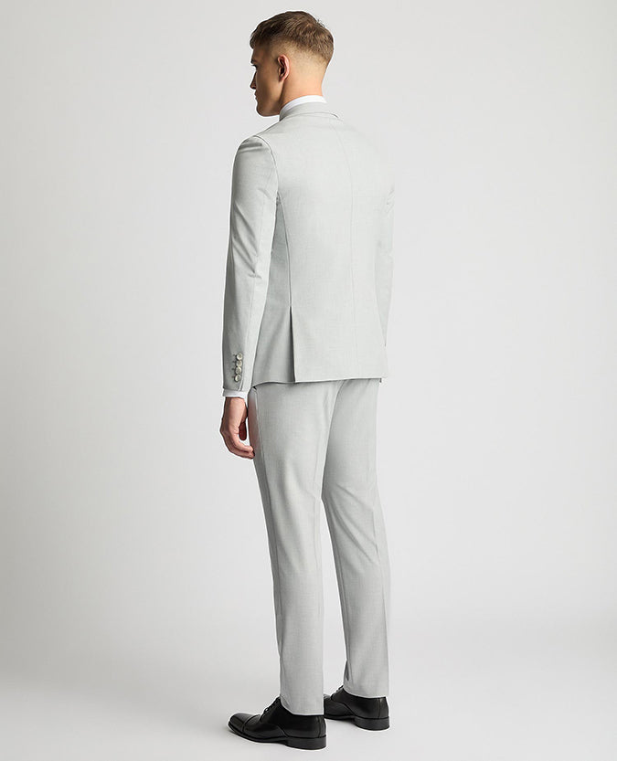 Man wearing a grey Slim Fit Stretch Double Breasted Suit Jacket