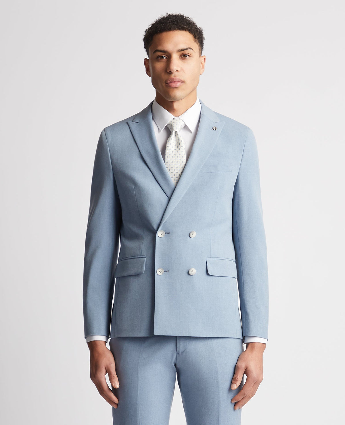 Man wearing a blue Slim Fit Stretch Double Breasted Suit Jacket