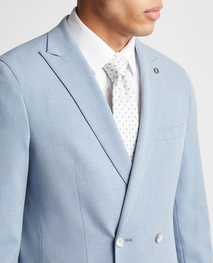 Man wearing a blue Slim Fit Stretch Double Breasted Suit Jacket
