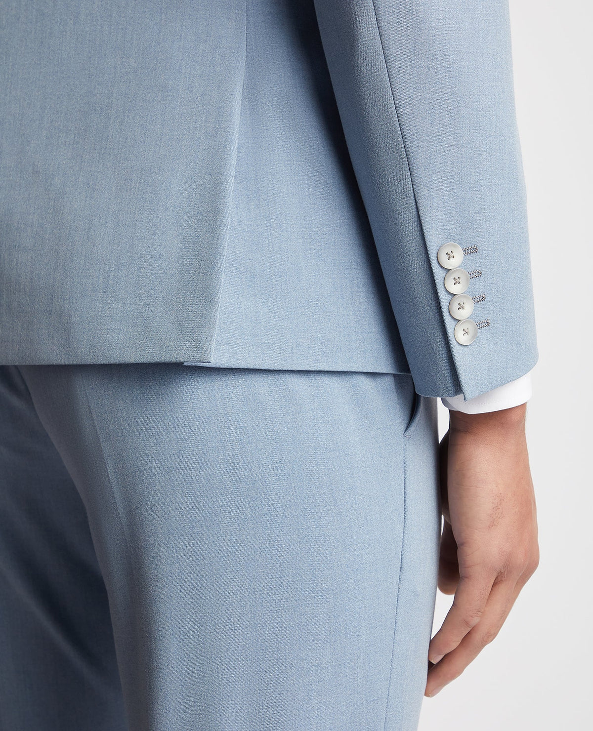Man wearing a blue Slim Fit Stretch Double Breasted Suit Jacket