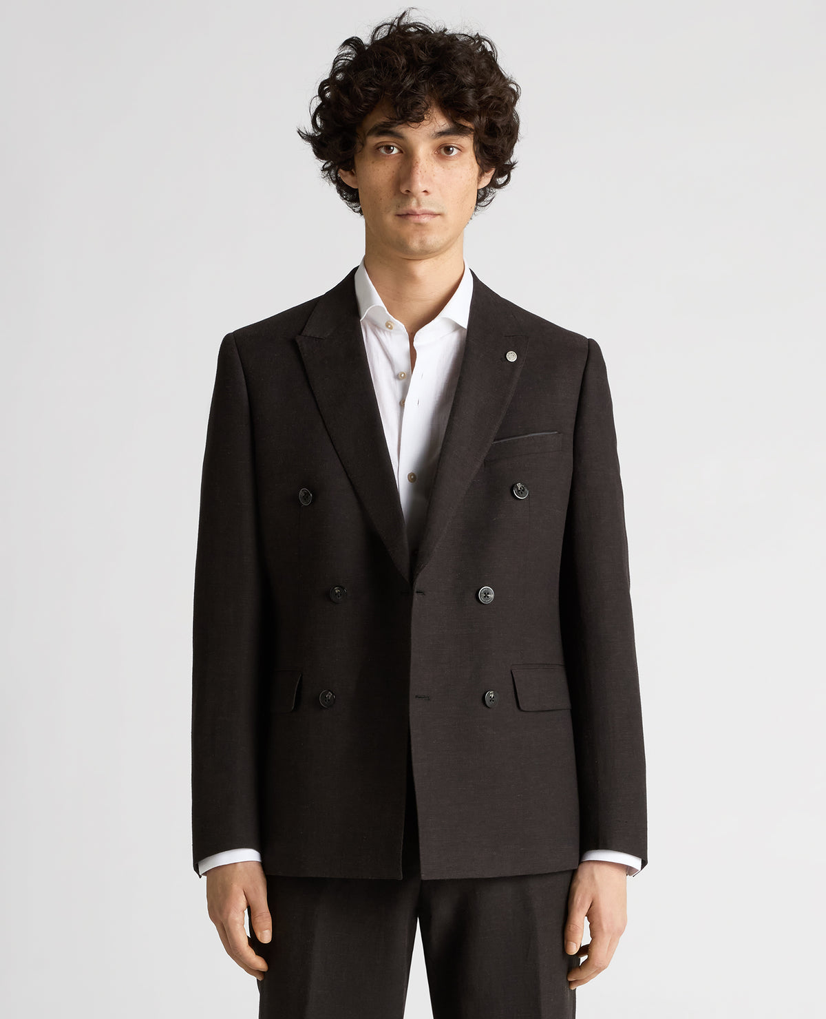 Man wearing a black Slim Fit Double-Breasted Linen-Blend Suit Jacket