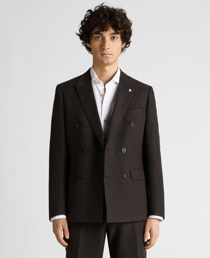 Man wearing a black Slim Fit Double-Breasted Linen-Blend Suit Jacket