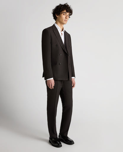 Man wearing a black Slim Fit Double-Breasted Linen-Blend Suit Jacket