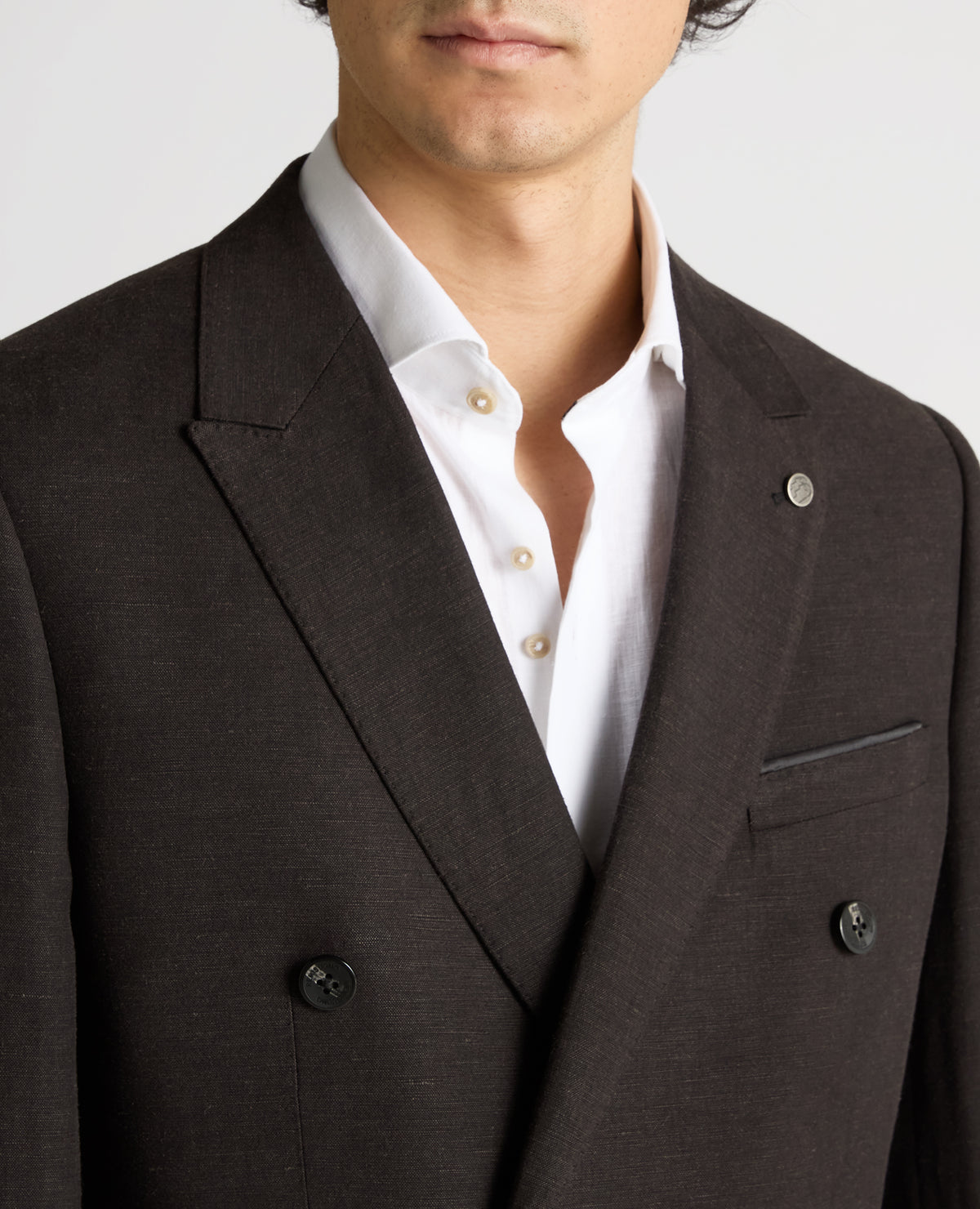 Man wearing a black Slim Fit Double-Breasted Linen-Blend Suit Jacket