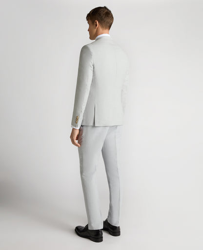 Man wearing a blue Slim Fit Linen-Blend Double Breasted Suit