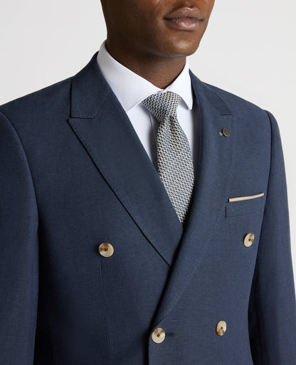 Man wearing a blue Slim Fit Linen-Blend Double Breasted Suit