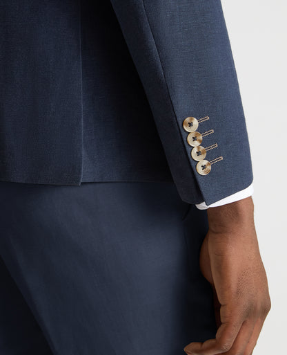 Man wearing a blue Slim Fit Linen-Blend Double Breasted Suit