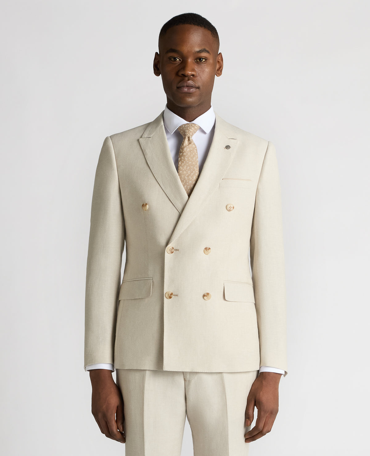 Man wearing a sand Slim Fit Linen-Blend Double Breasted Suit