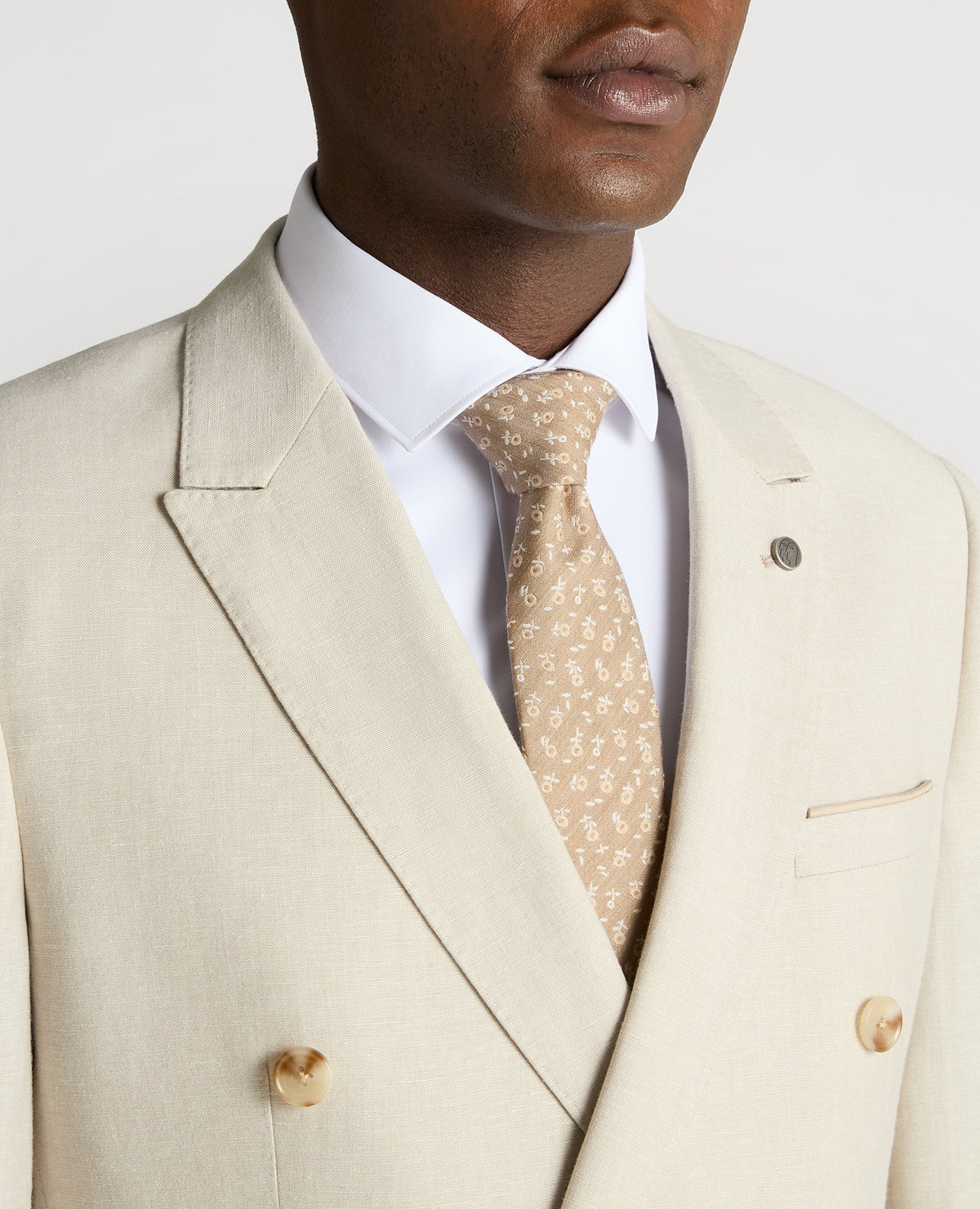 Man wearing a sand Slim Fit Linen-Blend Double Breasted Suit