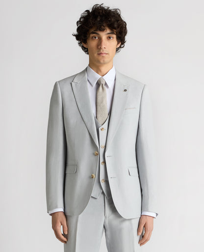 Man wearing a blue Slim Fit Linen-Blend Suit Jacket