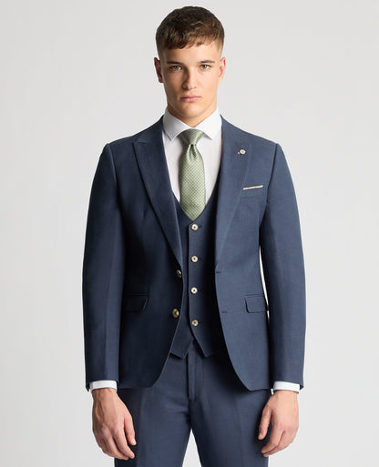 Man wearing a blue Slim Fit Linen-Blend Suit