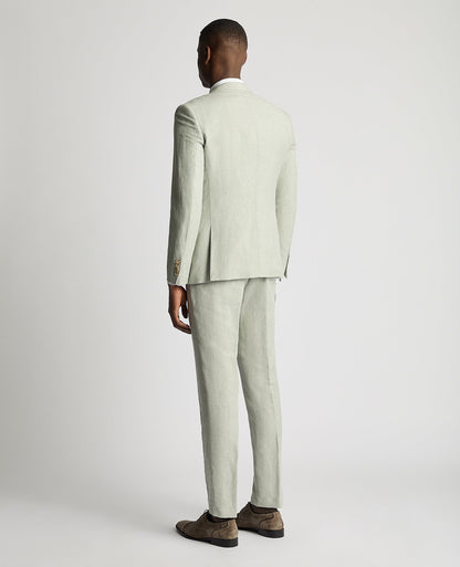 Man wearing a green Slim Fit Linen-Blend Suit