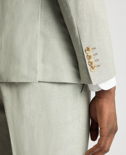 Man wearing a green Slim Fit Linen-Blend Suit