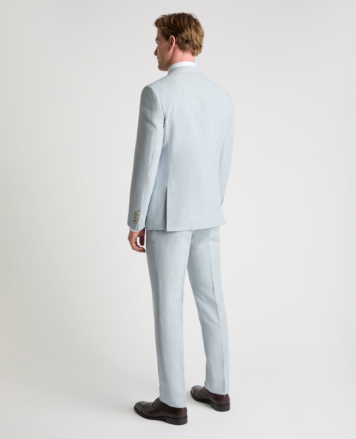 Man wearing a blue suit