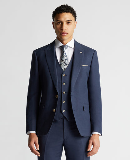 Man wearing a blue Tapered Fit Linen-Blend Suit