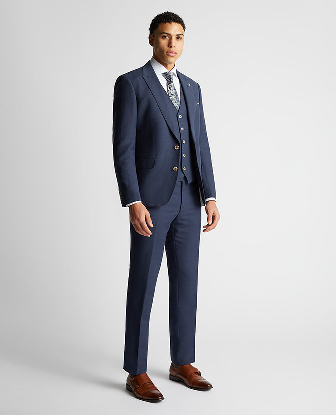 Man wearing a blue Tapered Fit Linen-Blend Suit