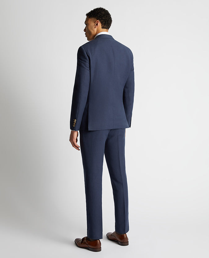 Man wearing a blue Tapered Fit Linen-Blend Suit