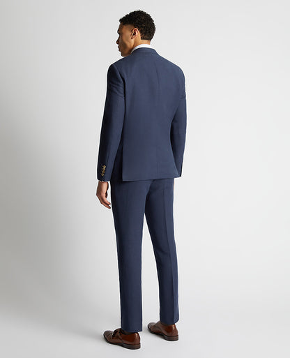 Man wearing a blue Tapered Fit Linen-Blend Suit