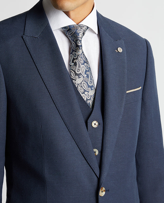Man wearing a blue Tapered Fit Linen-Blend Suit