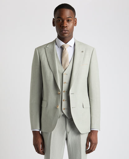 Man wearing a green Tapered Fit Linen-Blend Suit