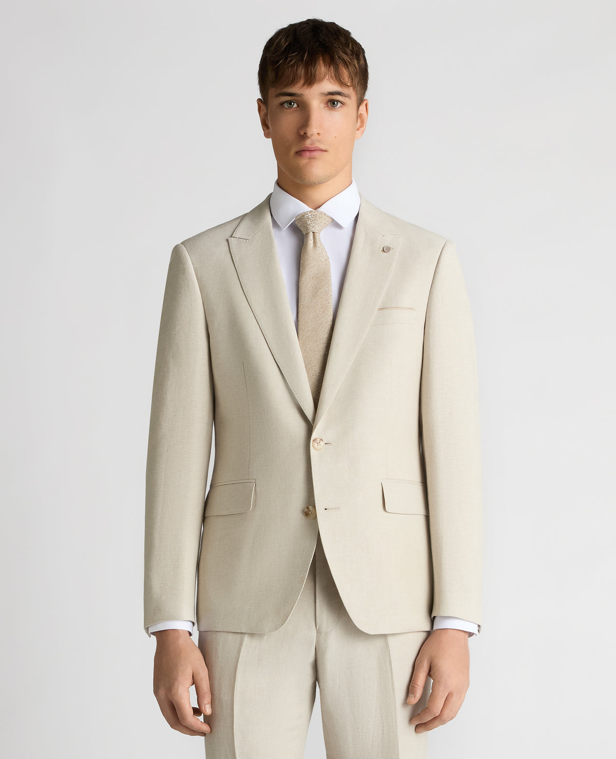 Man wearing a sand Tapered Fit Linen-Blend Suit Jacket