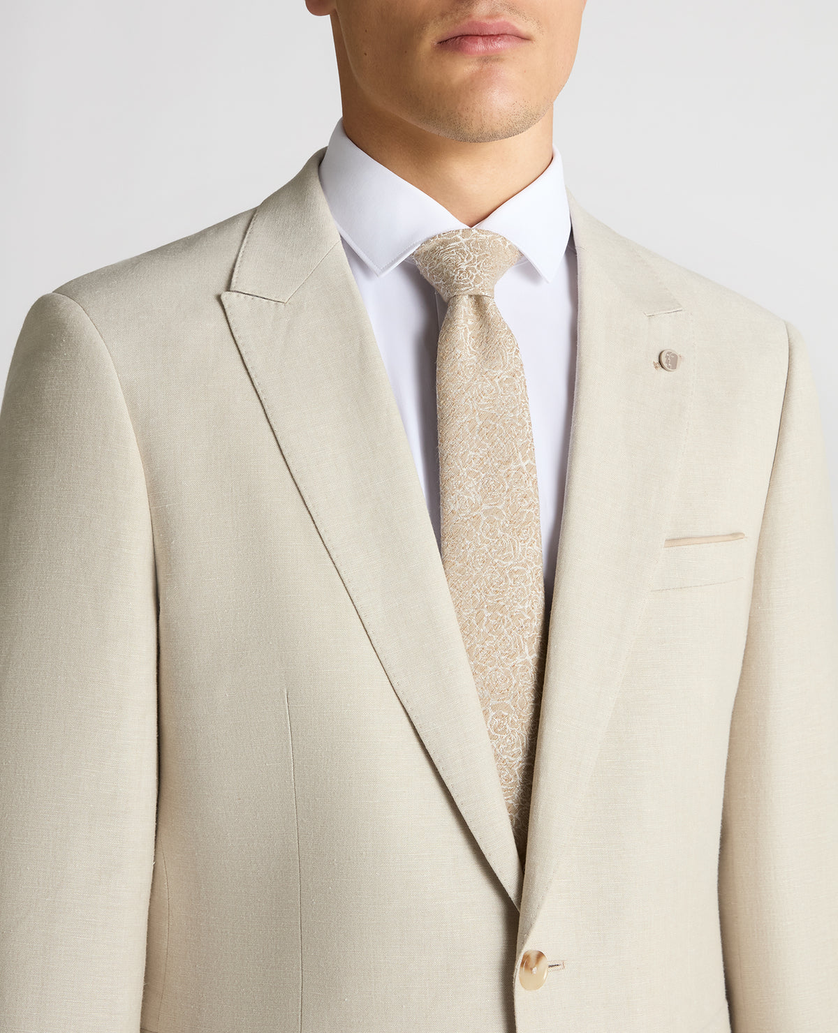 Man wearing a sand Tapered Fit Linen-Blend Suit Jacket