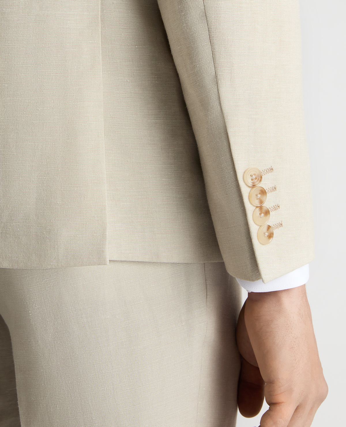 Man wearing a sand Tapered Fit Linen-Blend Suit Jacket