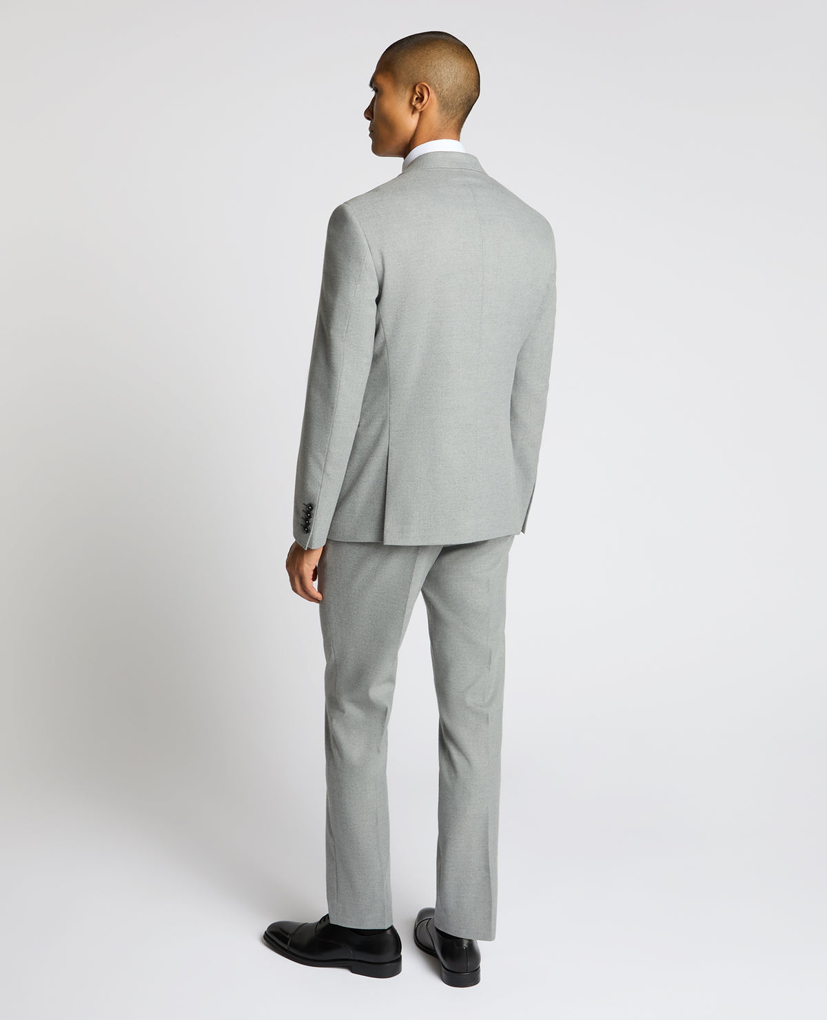 Man wearing a grey Slim Fit Double-Breasted Stretch Jacket