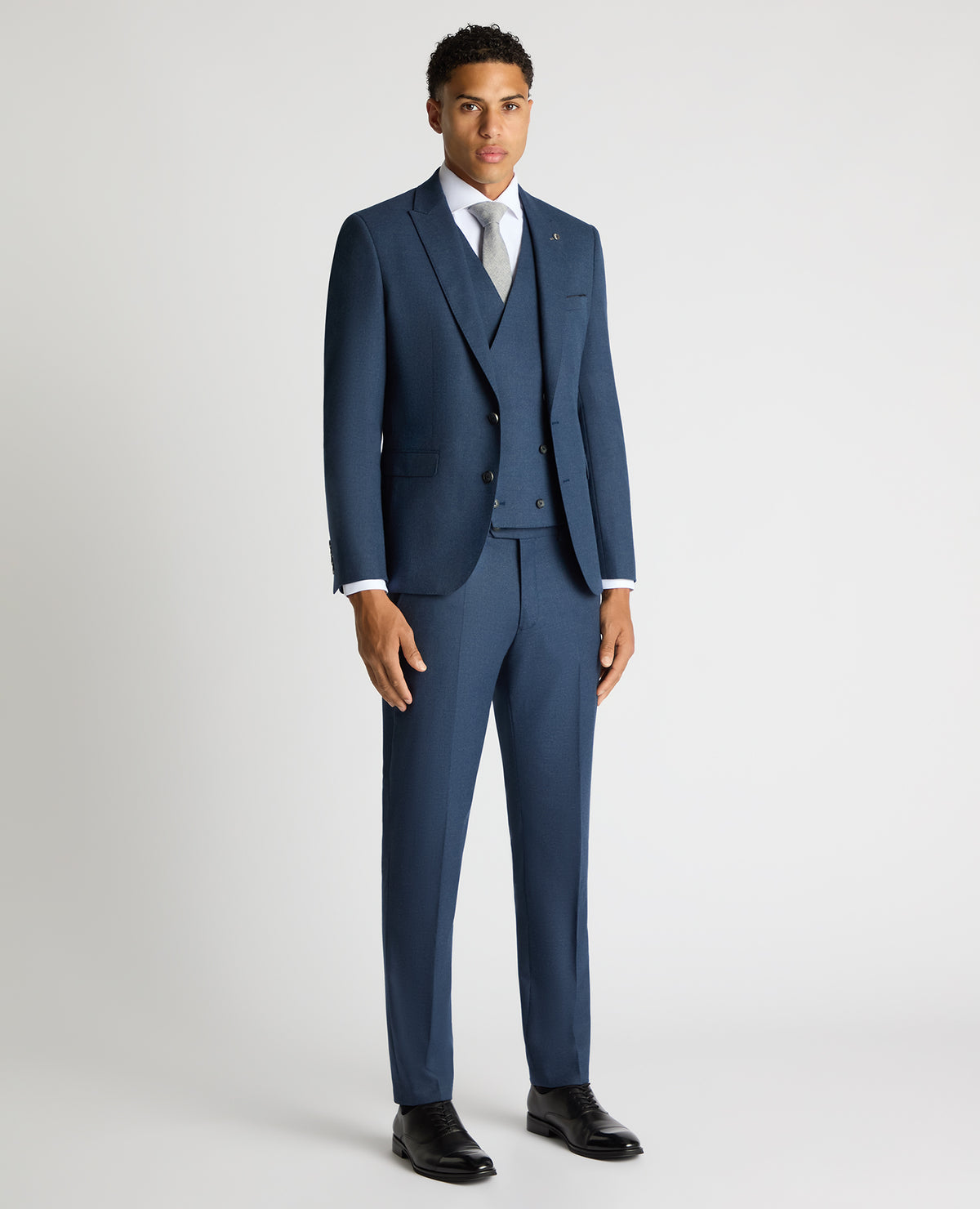Man wearing a blue Slim Fit Stretch Suit